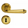 Siena Door Handle on Round Rose With Keyhole Covers With Spring in Brass for House Bal Becchetti