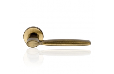 Spring Zincral Bronzed Brass Door Handle With Rose of Soft Shape Linea Calì Design